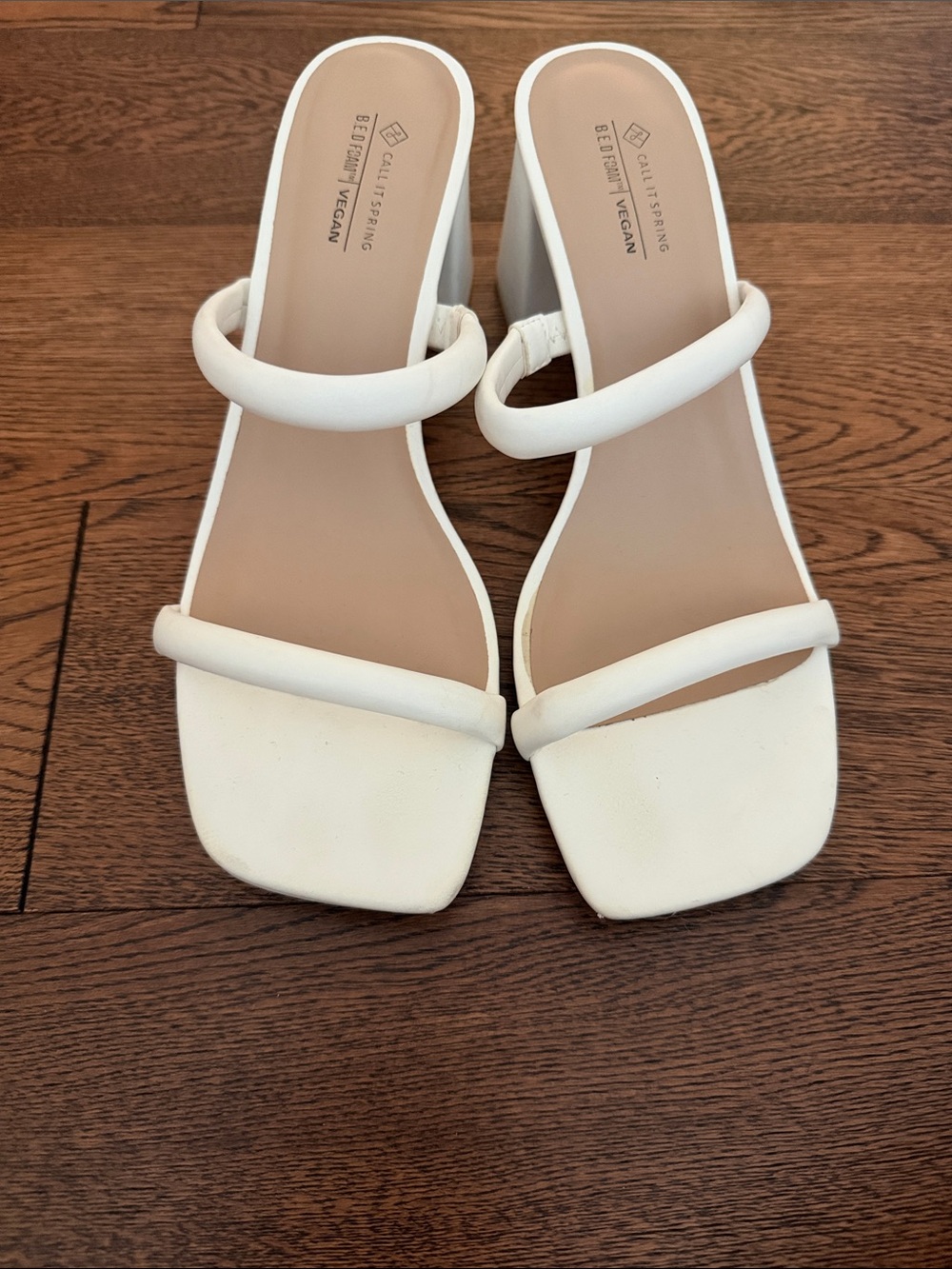 Call it Spring white sandals